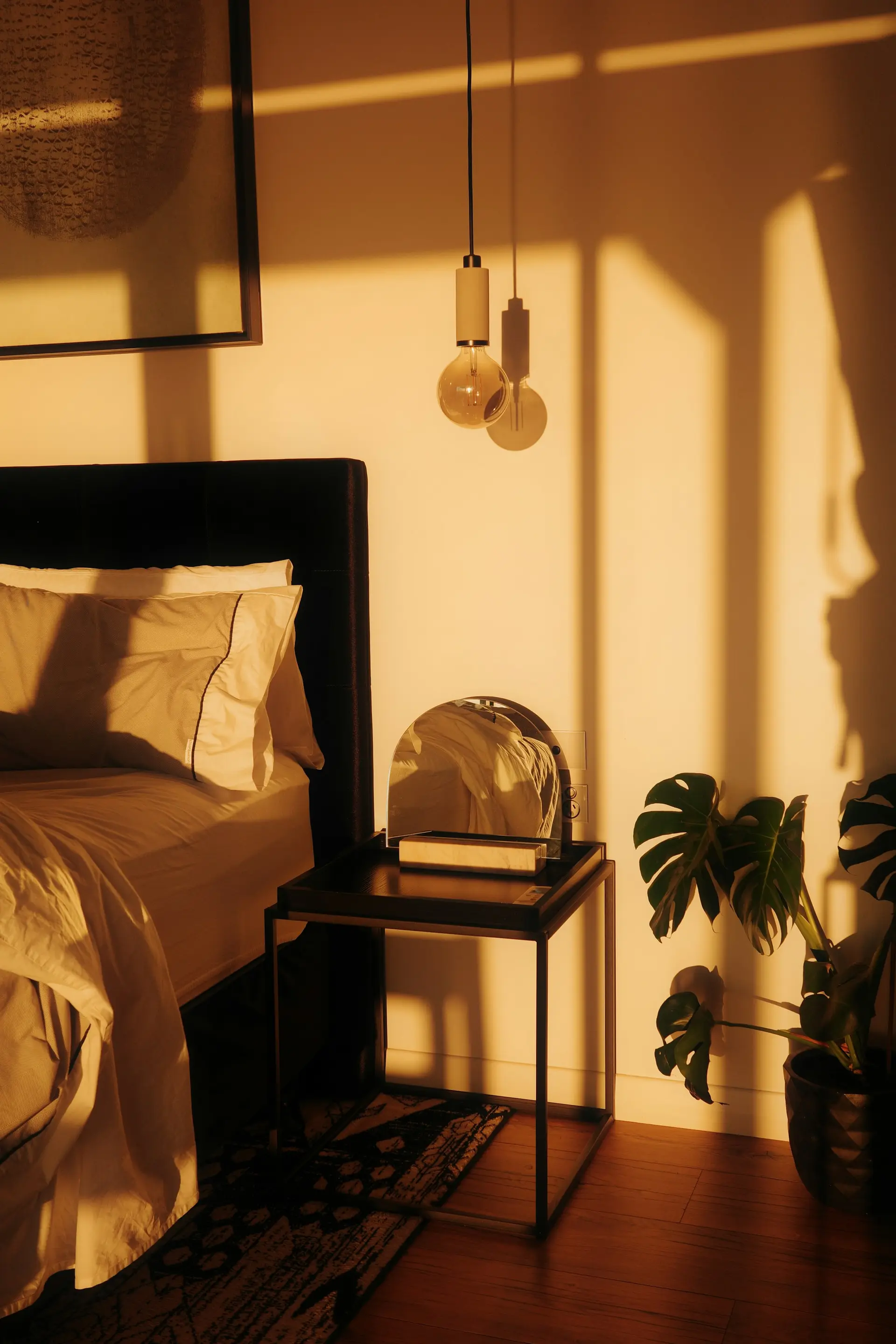 Warm pendant light in a quiet bedroom